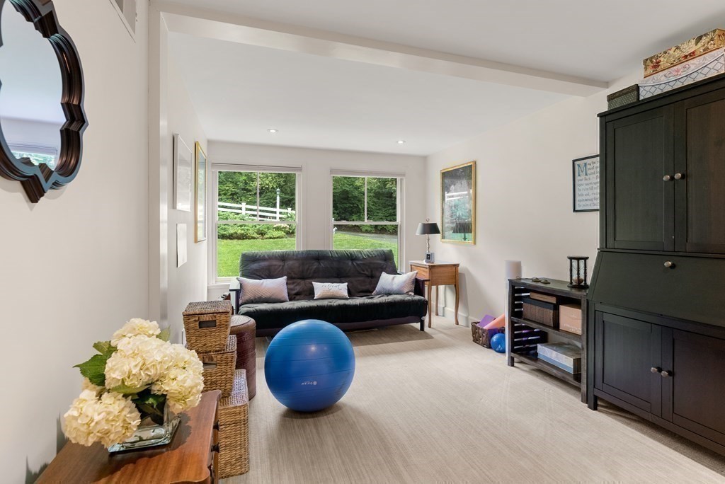 328 Dover Road Westwood, MA 02090 - Photo 26 of 41 a living room with furniture and a window