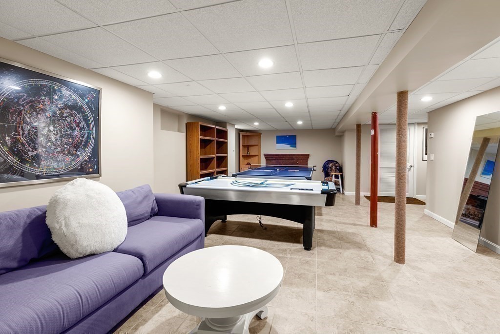 328 Dover Road Westwood, MA 02090 - Photo 28 of 41 a living room with furniture and a wooden floor