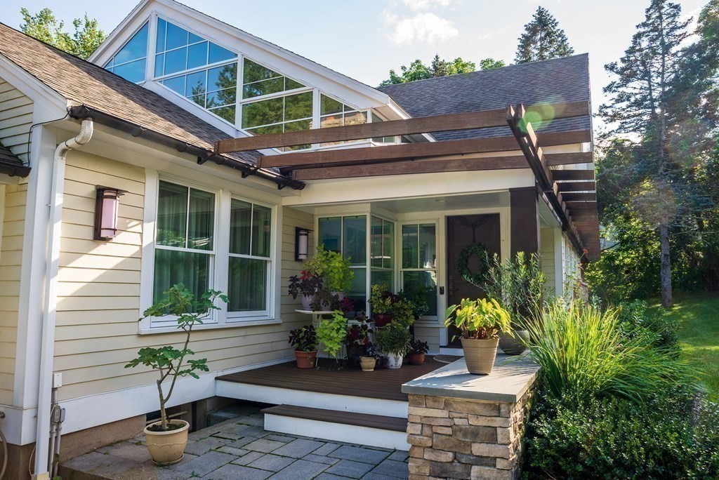 328 Dover Road Westwood, MA 02090 - Photo 3 of 41 a front view of a house with garden