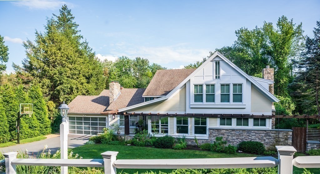 328 Dover Road Westwood, MA 02090 - Photo 32 of 41 a front view of a house with a yard
