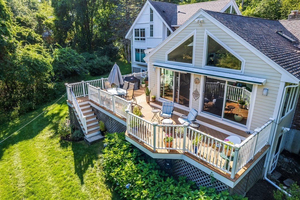 328 Dover Road Westwood, MA 02090 - Photo 37 of 41 a view of house with a deck and furniture