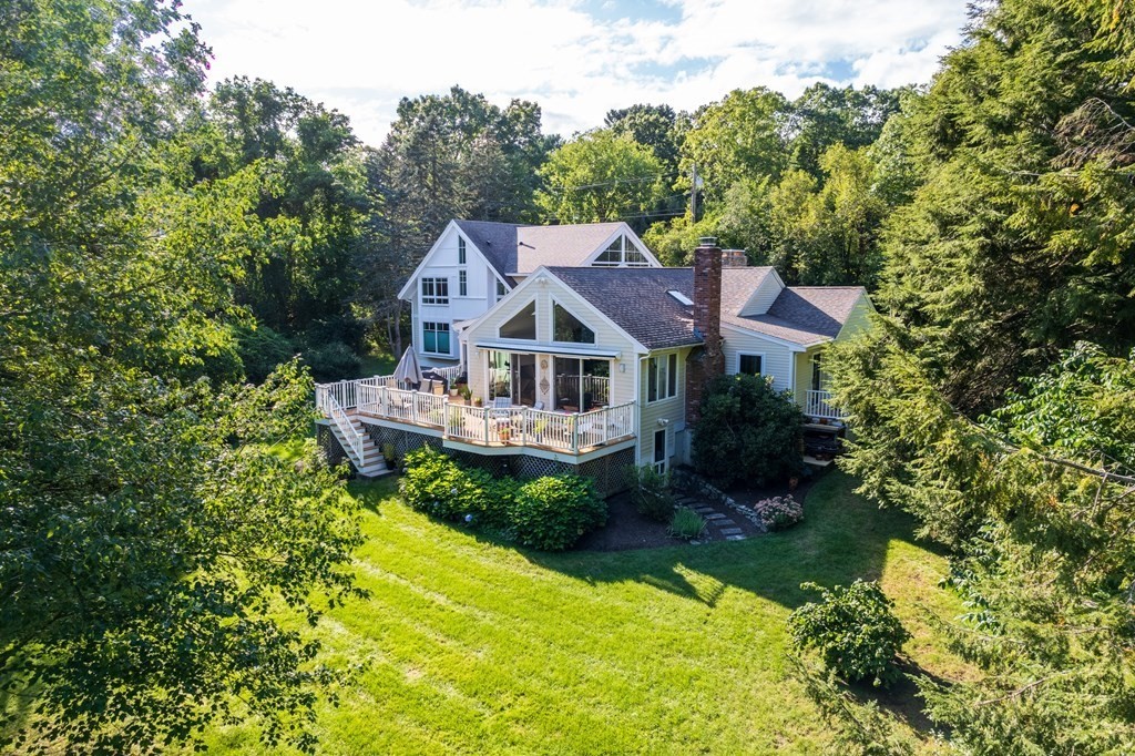 328 Dover Road Westwood, MA 02090 - Photo 39 of 41 a aerial view of a house with swimming pool next to a yard