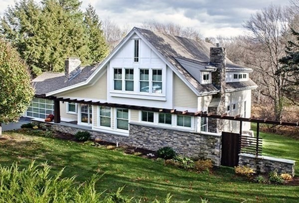 328 Dover Road Westwood, MA 02090 - Photo 40 of 41 a front view of a house with a yard