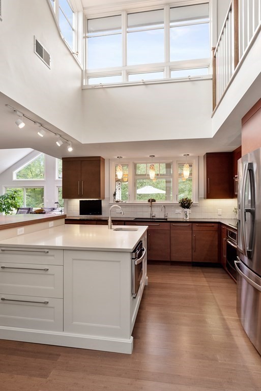 328 Dover Road Westwood, MA 02090 - Photo 7 of 41 a kitchen with stainless steel appliances a sink and a stove