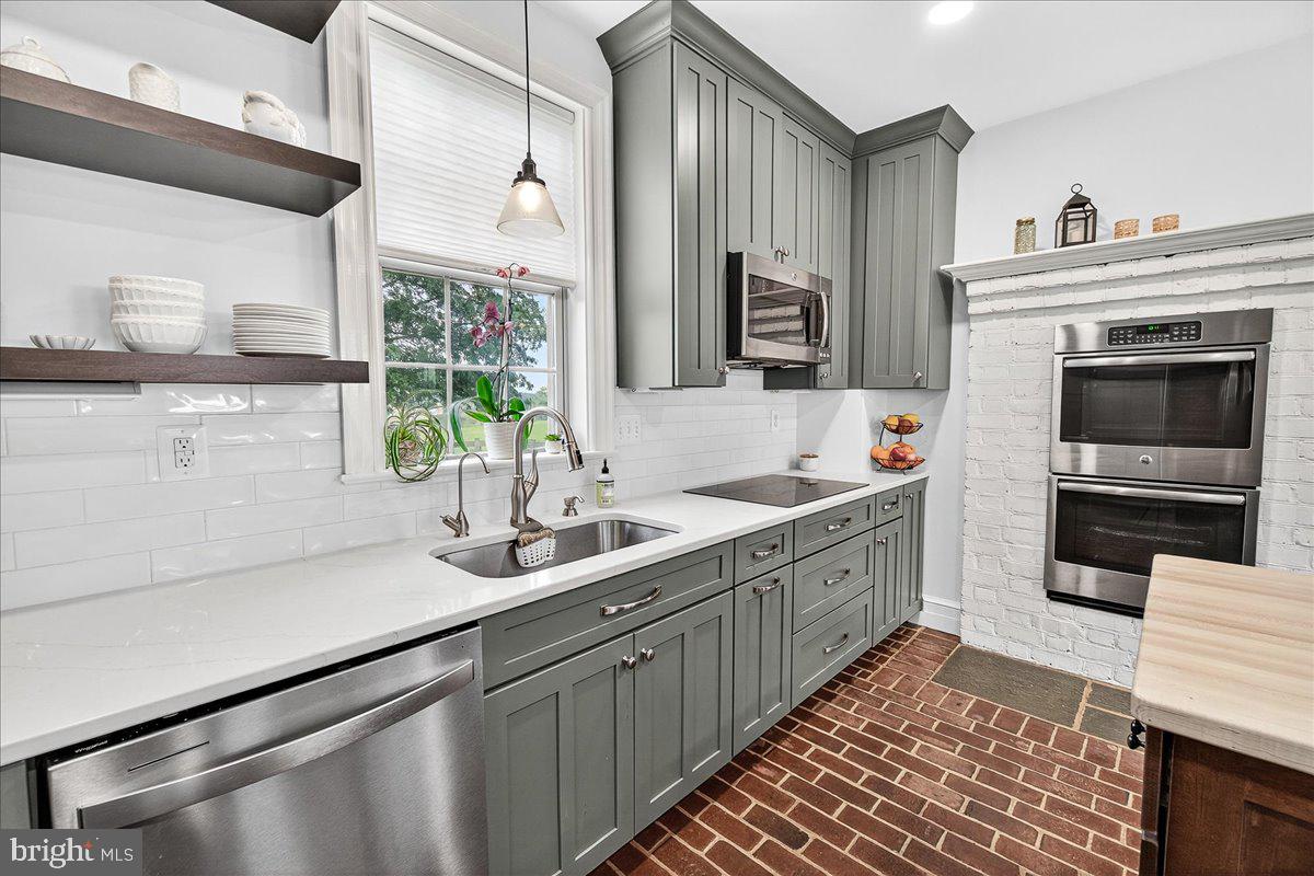 9522 Bessie Clemson Road Union Bridge, MD 21791 - Photo 22 of 107 a spacious bathroom with a double vanity sink a mirror and a bathtub