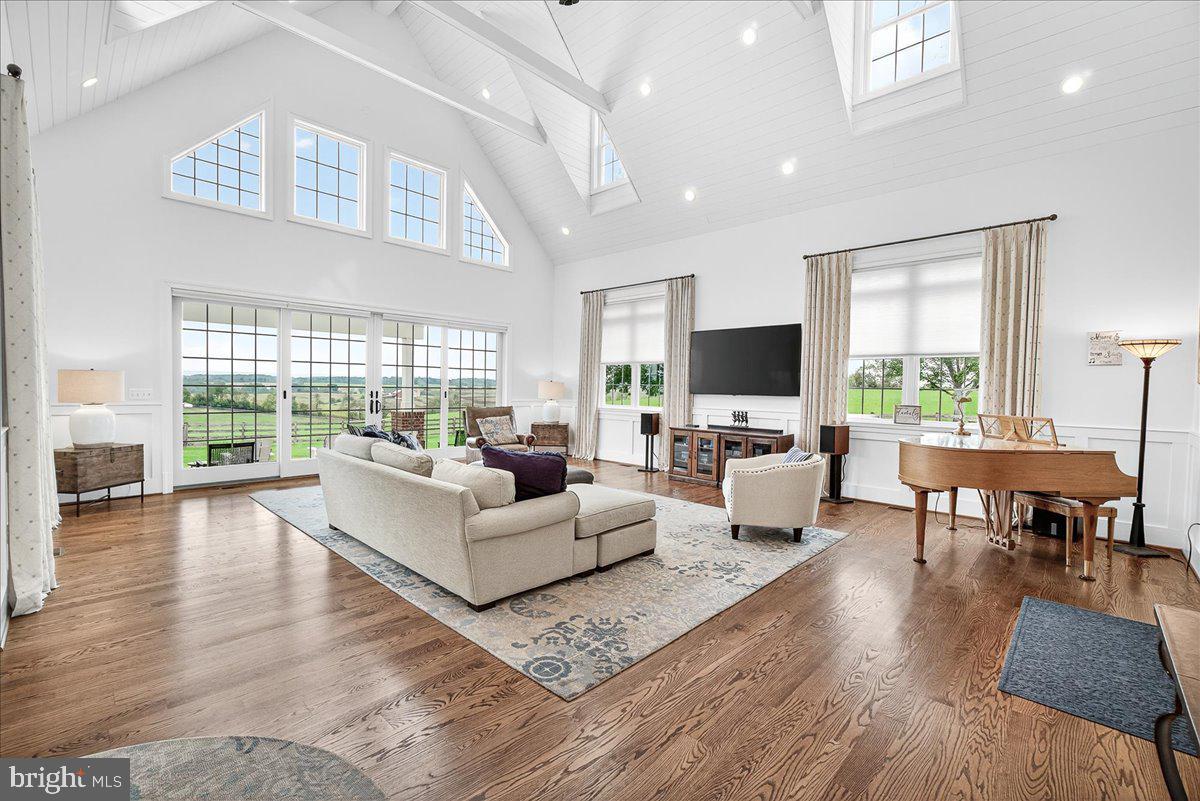 9522 Bessie Clemson Road Union Bridge, MD 21791 - Photo 27 of 107 a living room with furniture flat screen tv and a large window