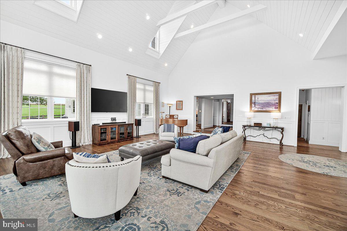 9522 Bessie Clemson Road Union Bridge, MD 21791 - Photo 30 of 107 a living room with furniture and a flat screen tv