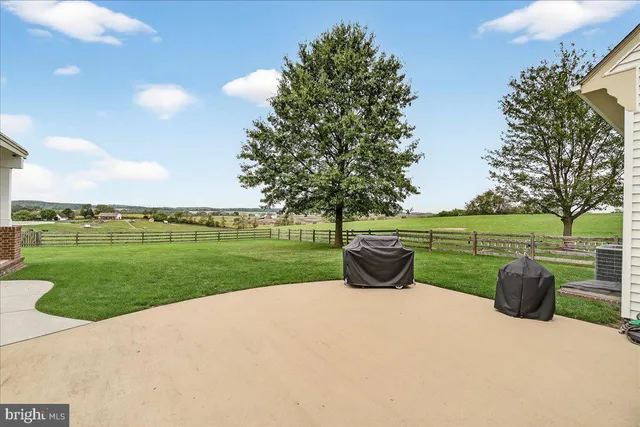 a view of a house with a big yard