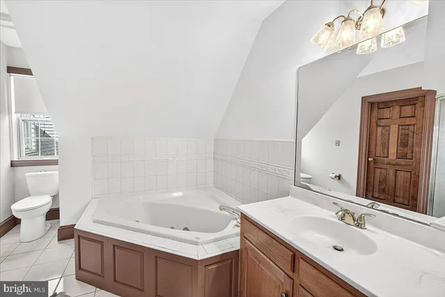 an aerial view of a house with outdoor space