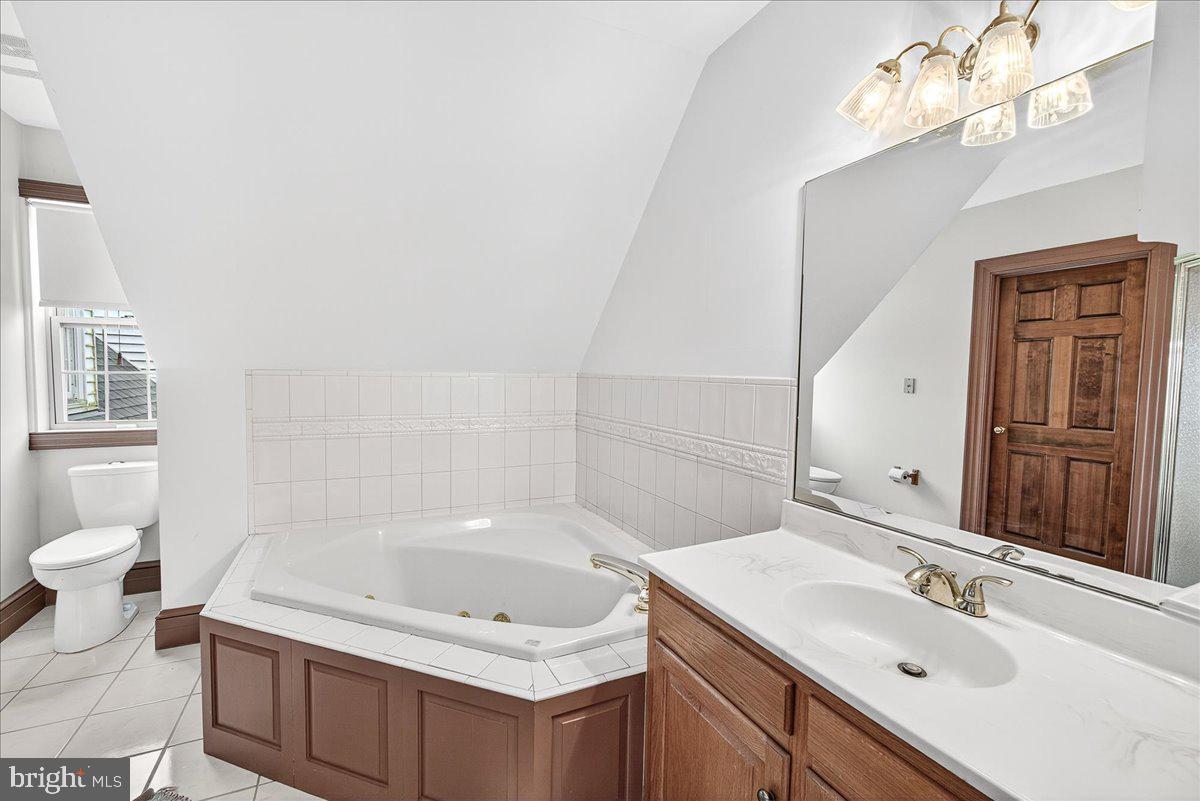 9522 Bessie Clemson Road Union Bridge, MD 21791 - Photo 50 of 107 a bathroom with a sink a toilet and a mirror