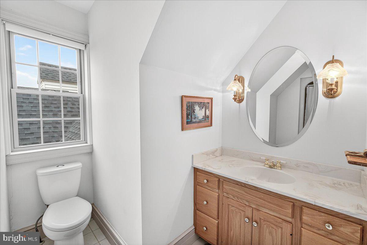 9522 Bessie Clemson Road Union Bridge, MD 21791 - Photo 55 of 107 a bathroom with a toilet a sink and mirror