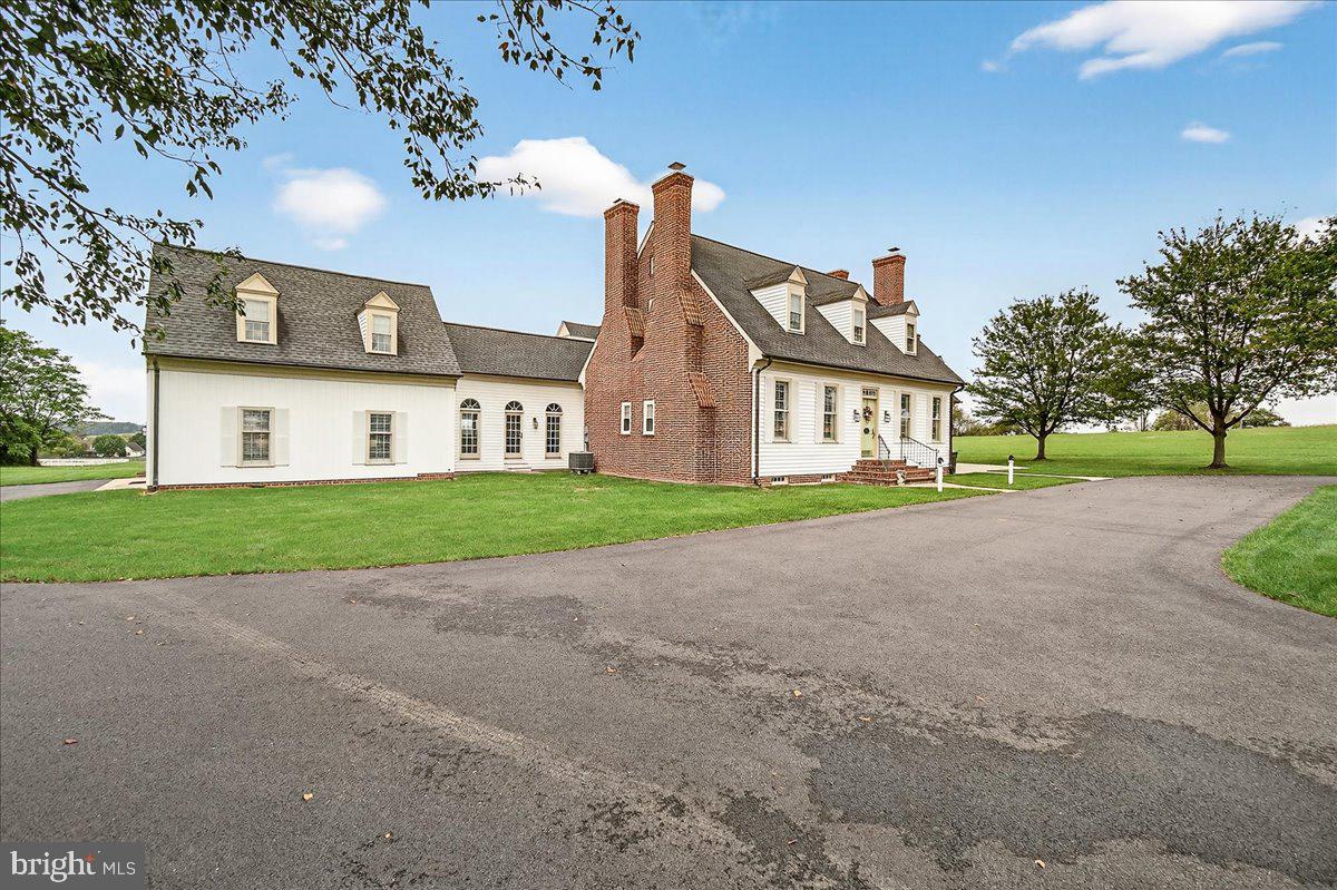 9522 Bessie Clemson Road Union Bridge, MD 21791 - Photo 6 of 107 a view of a house with a big yard and large trees