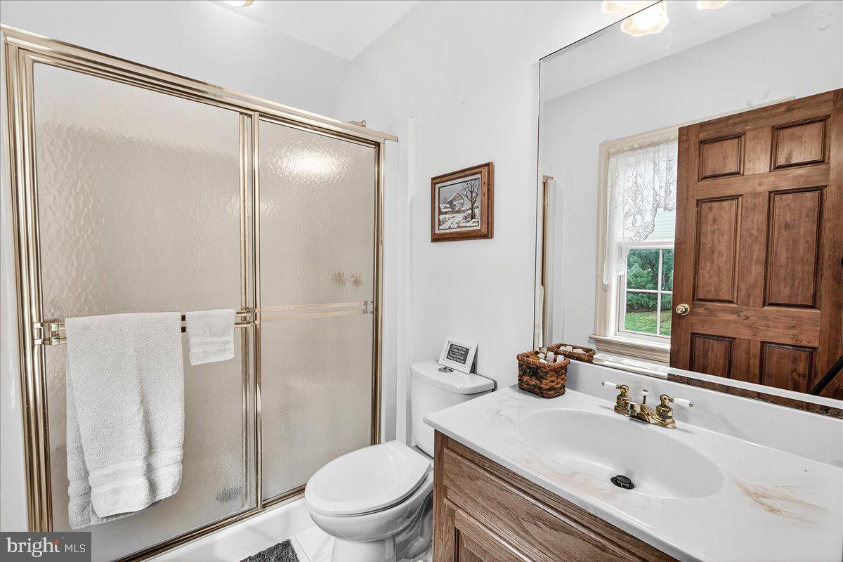9522 Bessie Clemson Road Union Bridge, MD 21791 - Photo 62 of 107 a bathroom with a sink toilet and shower