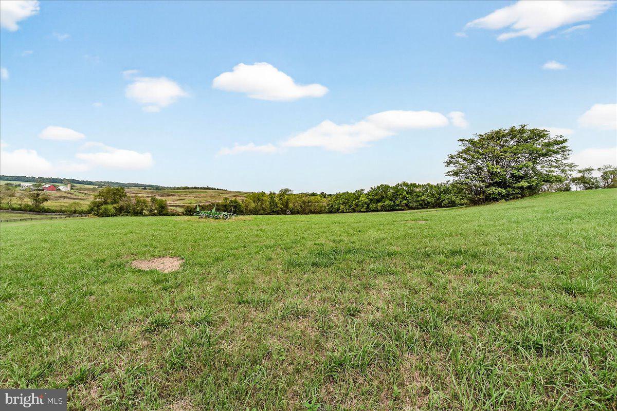 9522 Bessie Clemson Road Union Bridge, MD 21791 - Photo 78 of 107 a view of a lake with a big yard