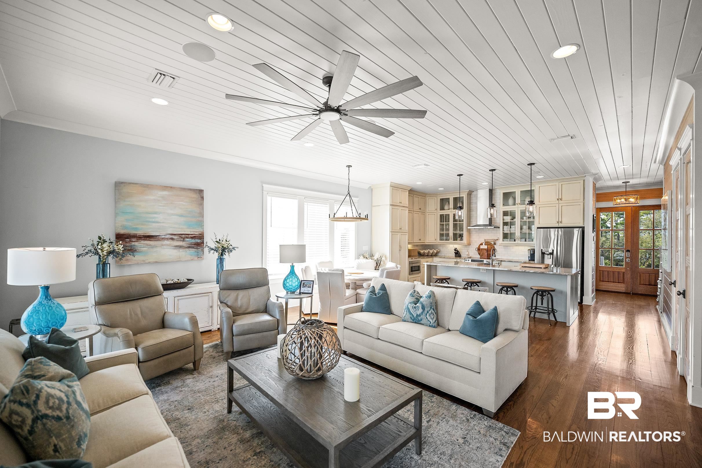 33186 Marlin Key Drive Orange Beach, AL 36561 - Photo 33 of 87 Living area featuring a ceiling fan, french doors, recessed lighting, dark wood-type flooring, and healthy amount of natural light