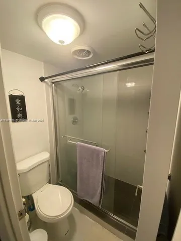 a view of a chairs and tables in the patio