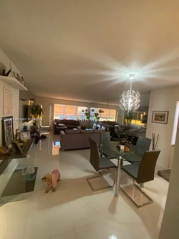 a view of a lake with a large building