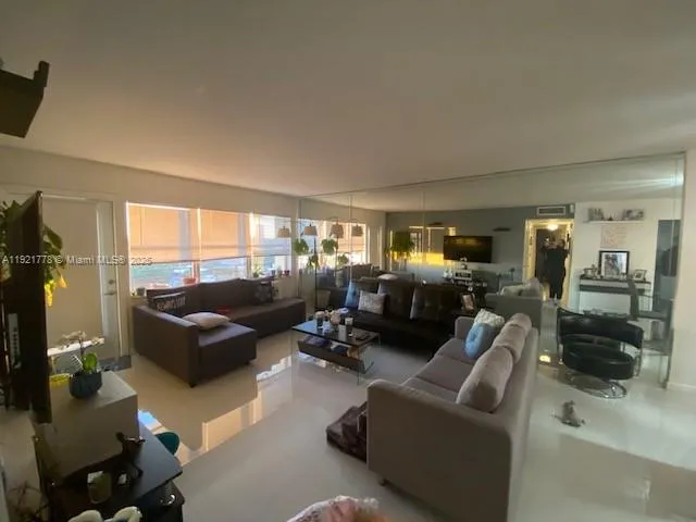 an aerial view of a house with a lake view