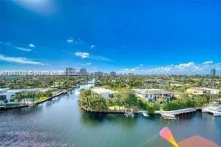 a view of a swimming pool and a yard