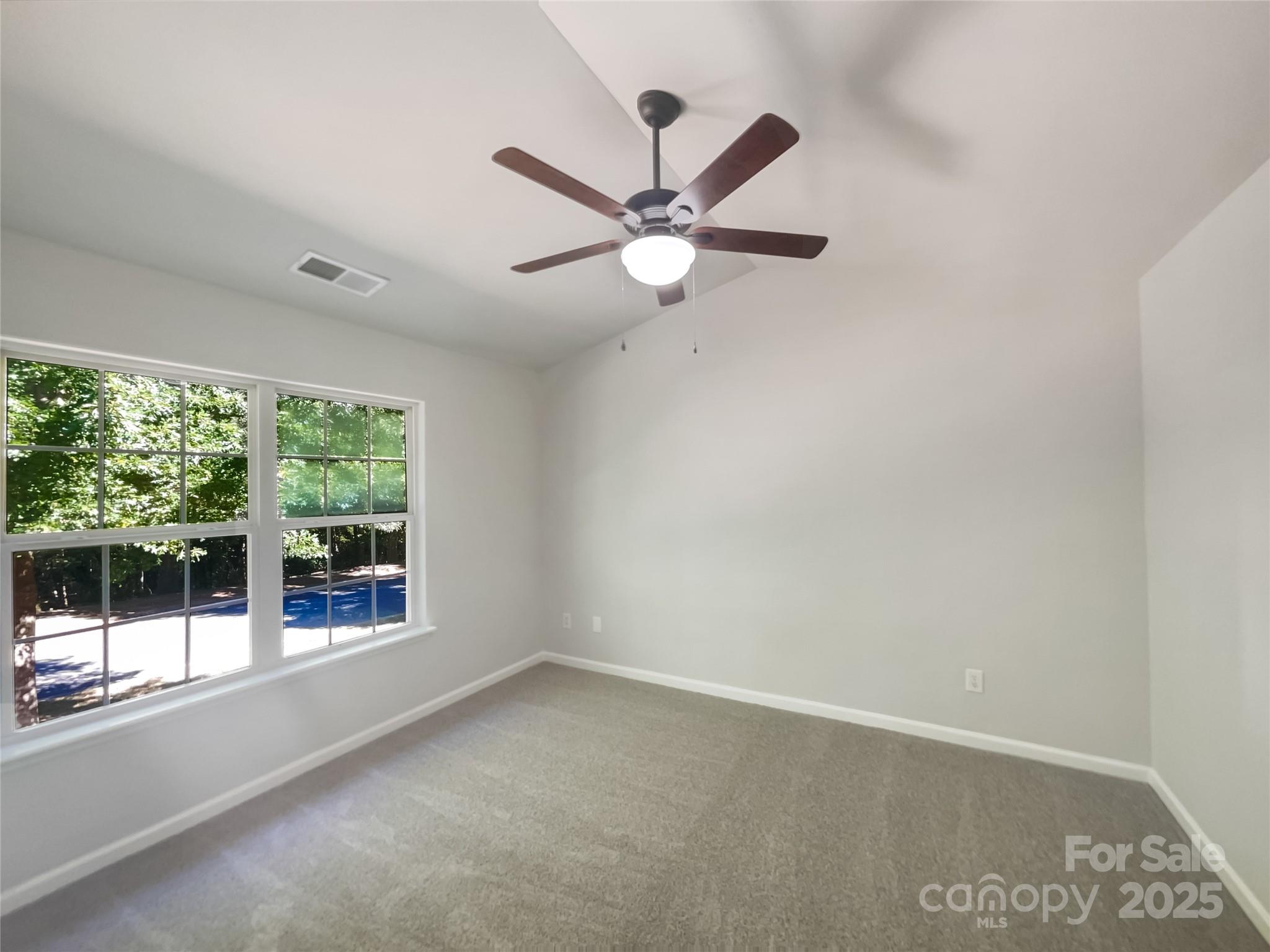 146 Marakery Road, Unit B Mooresville, NC 28115 - Photo 16 of 19 an empty room with a window