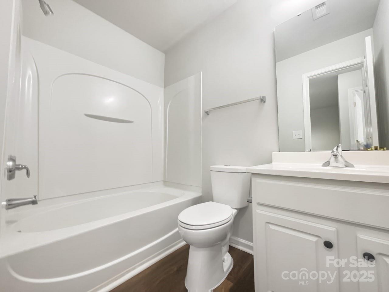 146 Marakery Road, Unit B Mooresville, NC 28115 - Photo 7 of 19 a bathroom with a sink toilet and shower