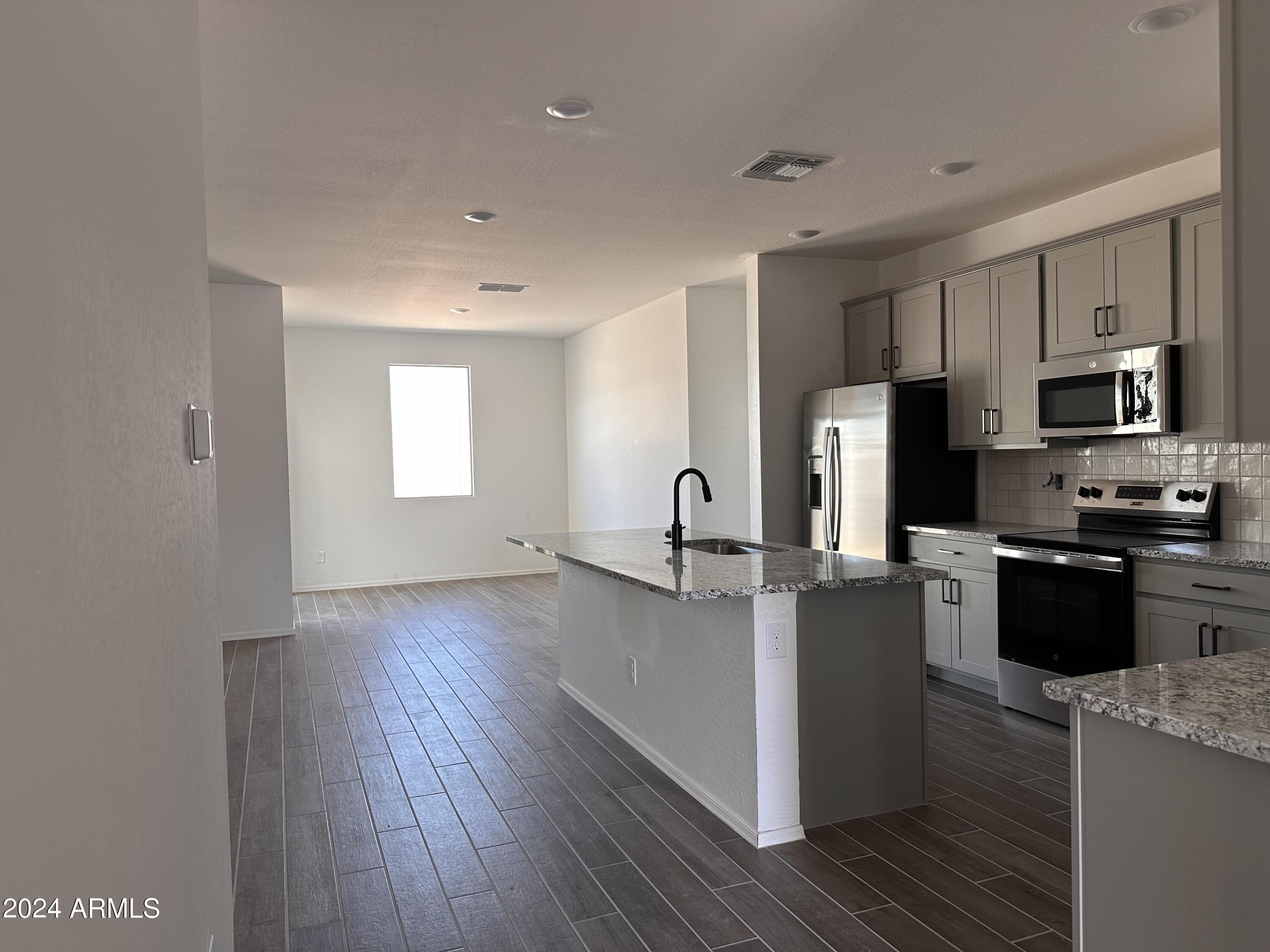 24092 West Pecan Road Buckeye, AZ 85326 - Photo 11 of 27 10-Kitchen & Dining Room
