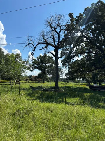 a view of a lake with a big yard