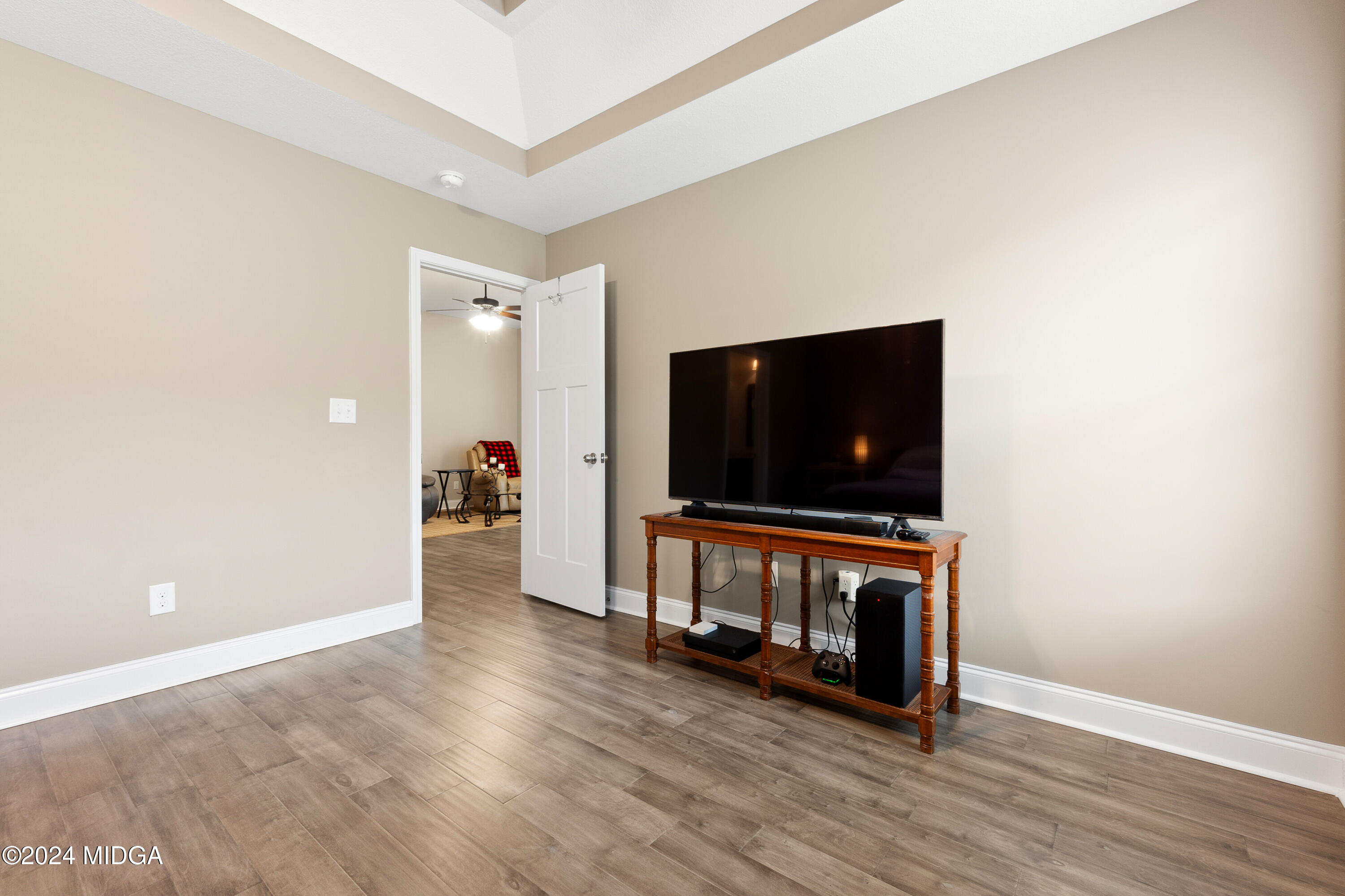 150 Hawks Rdg Trace Byron, GA 31008 - Photo 28 of 51 a living room with furniture and a flat screen tv