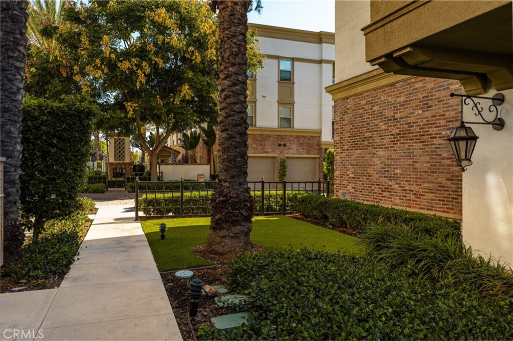 425 South Anaheim Boulevard, Unit 3 Anaheim, CA 92805 - Photo 11 of 53 a view of a patio with plants and large trees