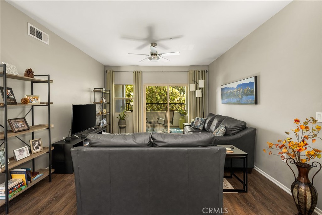 425 South Anaheim Boulevard, Unit 3 Anaheim, CA 92805 - Photo 21 of 53 a living room with furniture and a flat screen tv