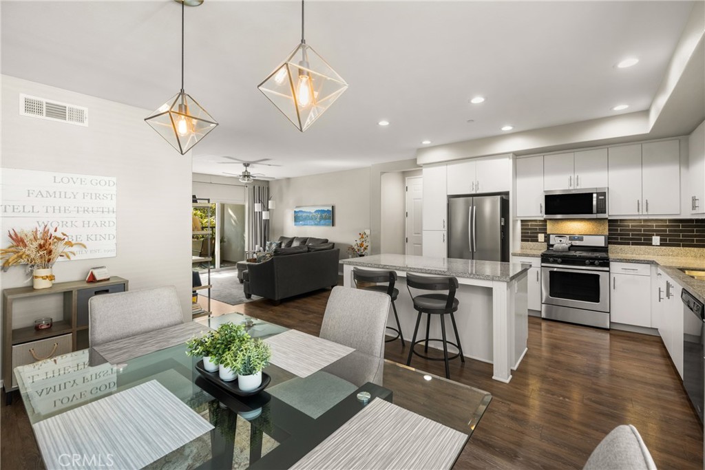 425 South Anaheim Boulevard, Unit 3 Anaheim, CA 92805 - Photo 36 of 53 a living room with furniture kitchen view and a refrigerator