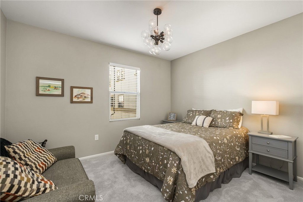 425 South Anaheim Boulevard, Unit 3 Anaheim, CA 92805 - Photo 38 of 53 a bedroom with a bed and a lamp