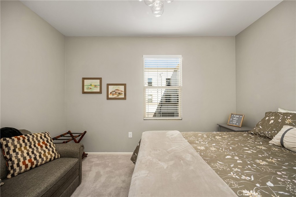 425 South Anaheim Boulevard, Unit 3 Anaheim, CA 92805 - Photo 39 of 53 a bedroom with a bed and a couch