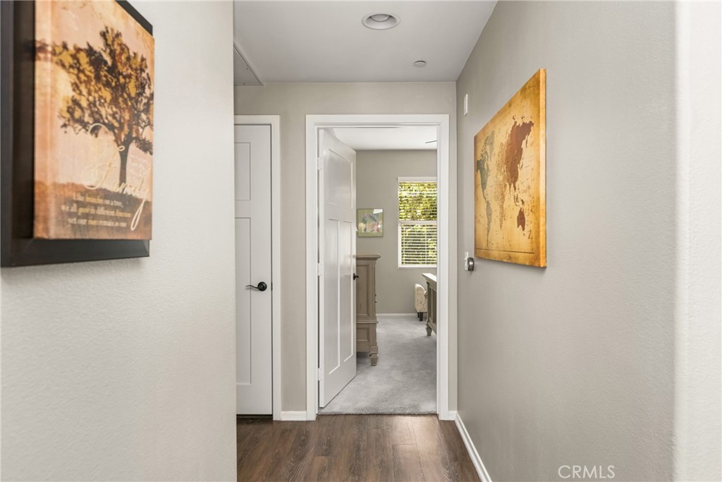 425 South Anaheim Boulevard, Unit 3 Anaheim, CA 92805 - Photo 41 of 53 a view of a hallway with wooden floor and a living room