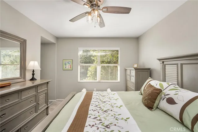a bathroom with a sink a mirror and shower