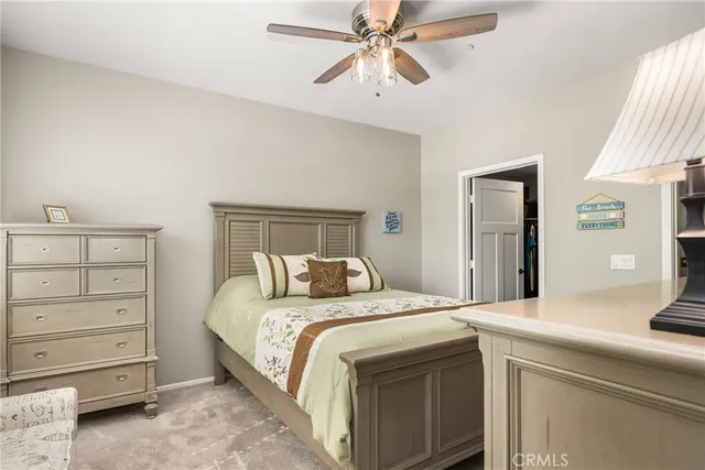 a bathroom with double vanity sinks and a mirror