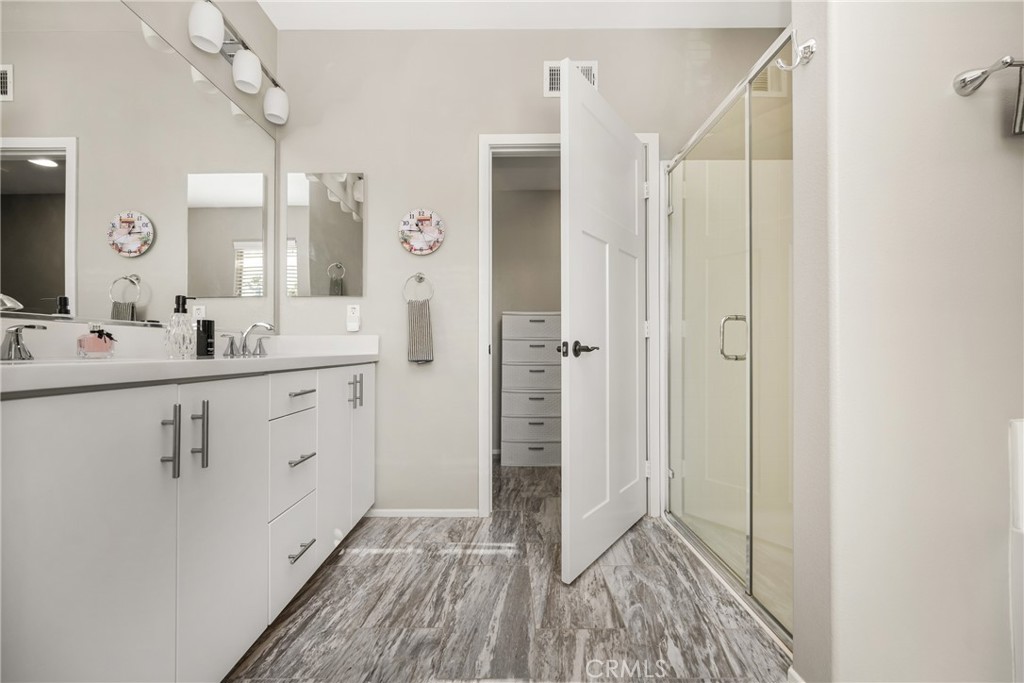 425 South Anaheim Boulevard, Unit 3 Anaheim, CA 92805 - Photo 49 of 53 a bathroom with a sink a mirror and shower