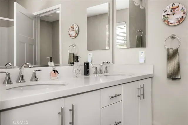 a view of a hallway with washer and dryer