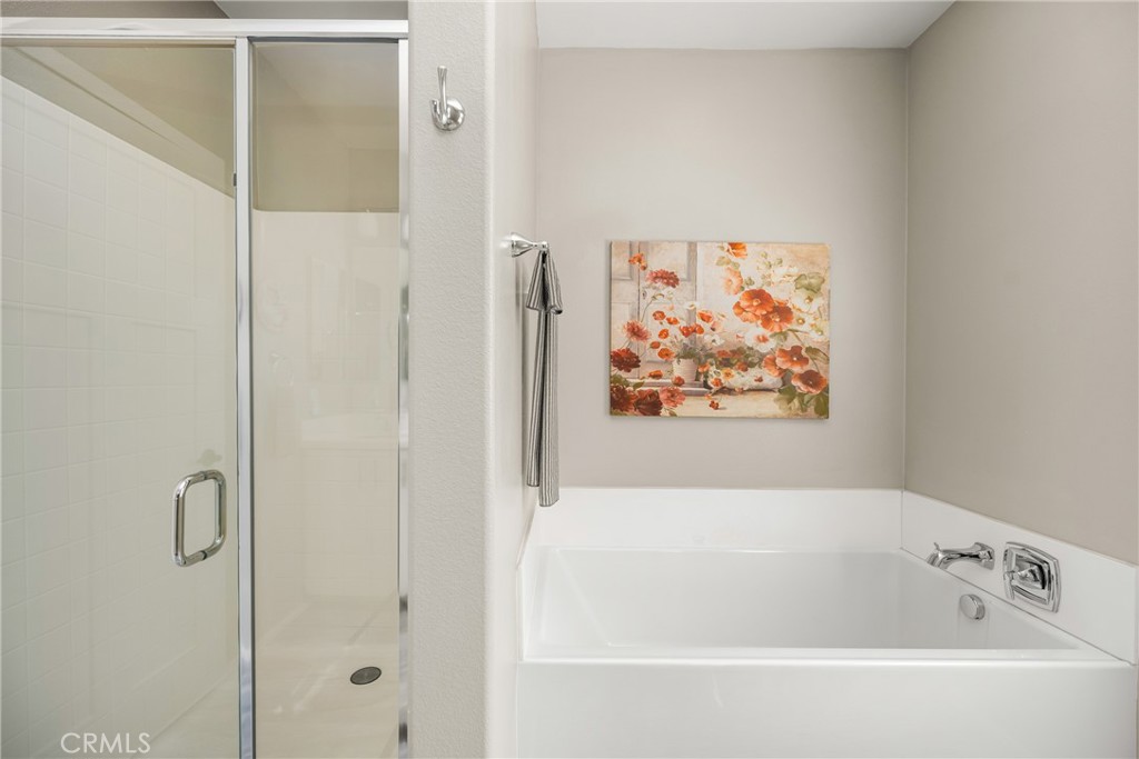 425 South Anaheim Boulevard, Unit 3 Anaheim, CA 92805 - Photo 51 of 53 a white bath tub sitting next to a shower