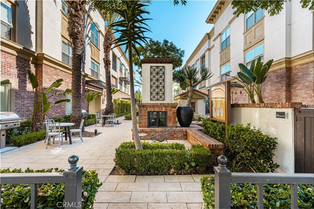 425 South Anaheim Boulevard, Unit 3 Anaheim, CA 92805 - Photo 8 of 53 a view of a building with garden and sitting area