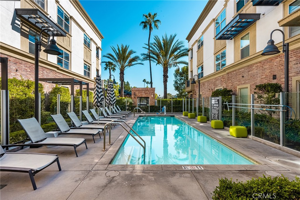 425 South Anaheim Boulevard, Unit 3 Anaheim, CA 92805 - Photo 9 of 53 a view of swimming pool with chairs