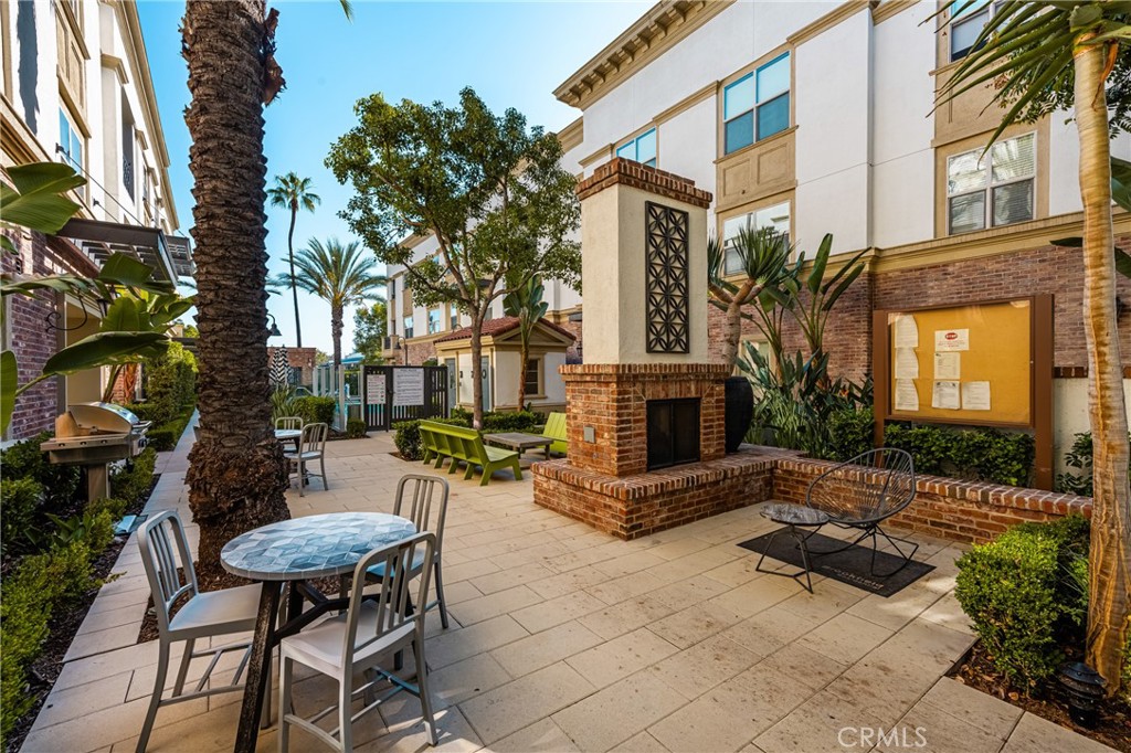425 South Anaheim Boulevard, Unit 3 Anaheim, CA 92805 - Photo 10 of 53 a view of a backyard with furniture and a fire pit