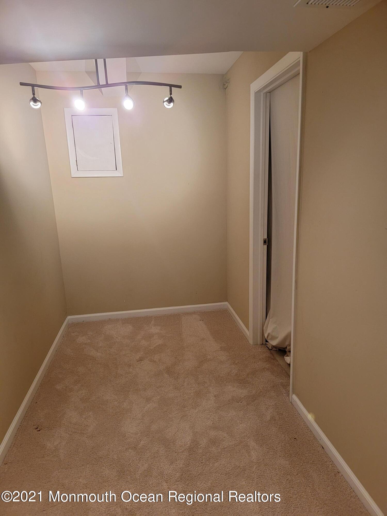 28 Musket Lane Eatontown, NJ 07724 - Photo 18 of 26 a view of an empty room