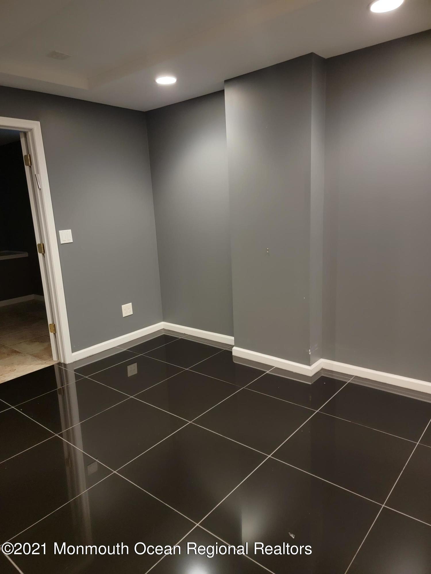 28 Musket Lane Eatontown, NJ 07724 - Photo 22 of 26 a room with gym equipment