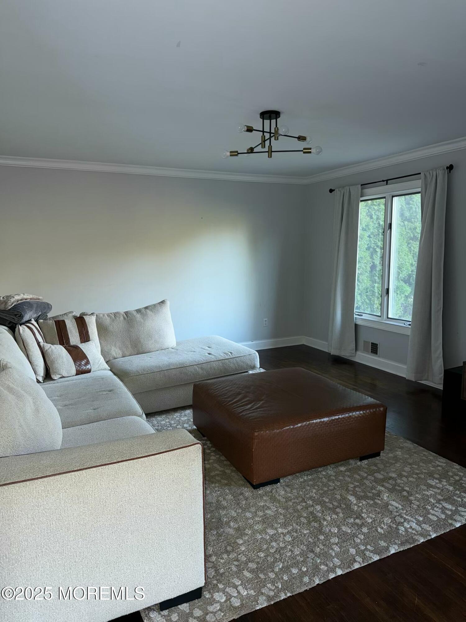 28 Musket Lane Eatontown, NJ 07724 - Photo 6 of 26 a living room with a couch