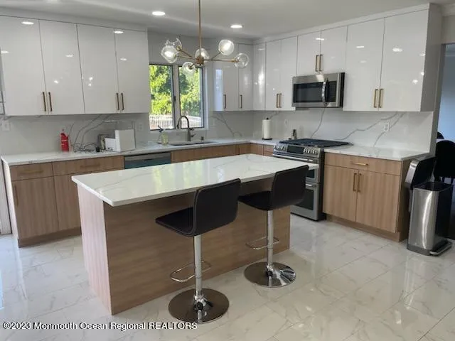 a bedroom with a bed and cabinet