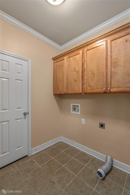 102 Red Fox Circle Haughton, LA 71037 - Photo 11 of 22 a view of an empty room with wooden floor and cabinets