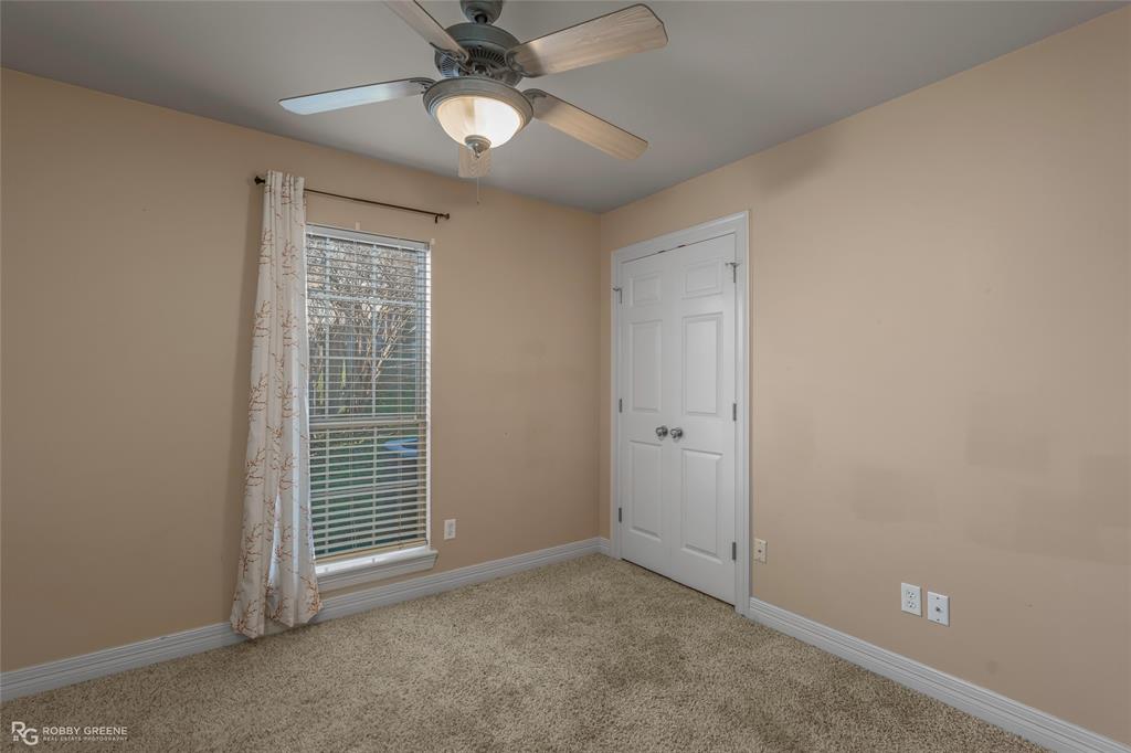 102 Red Fox Circle Haughton, LA 71037 - Photo 14 of 22 an empty room with windows and fan