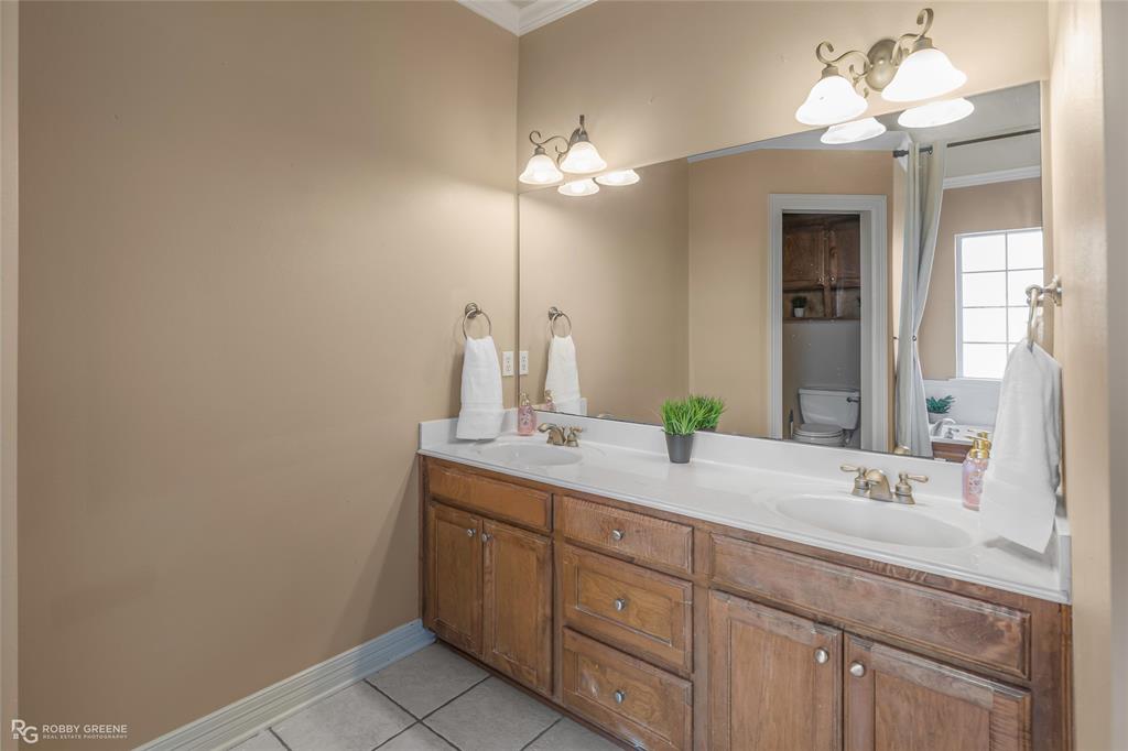 102 Red Fox Circle Haughton, LA 71037 - Photo 18 of 22 a bathroom with a sink and a mirror