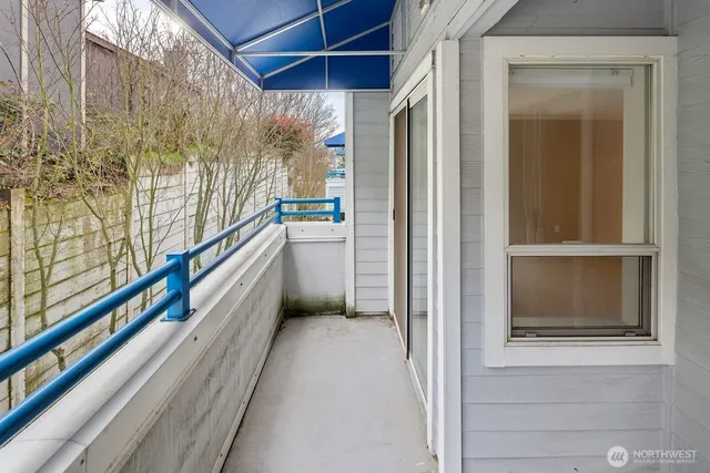 a view of a livingroom with furniture and front door